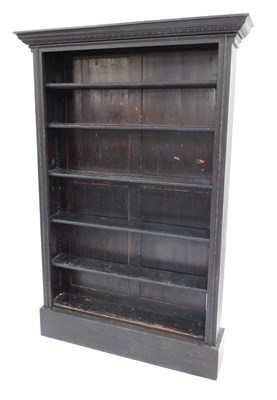 Lot 302 - An early 19thC ebonised open bookcase, with a...