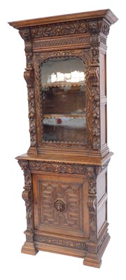 Lot 304 - A late 19thC Flemish-style carved oak display...