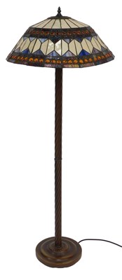 Lot 308 - A bronze effect Tiffany style floor lamp, the...