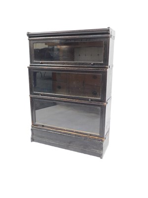 Lot 328 - An early 20thC Globe Wernicke style ebonised...