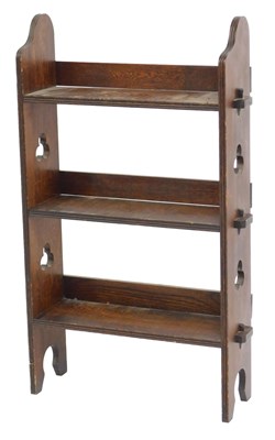 Lot 330 - An early 20thC oak open bookcase, with shaped...