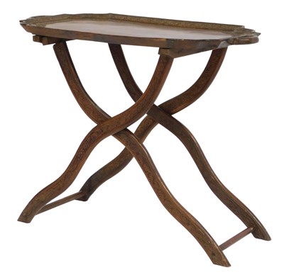 Lot 345 - An Eastern hardwood tray-top table, featuring...