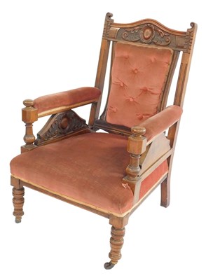 Lot 355 - A Victorian walnut armchair, with a button and...