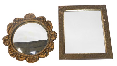 Lot 356 - A gilt gesso convex wall mirror, the circular...