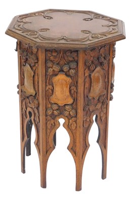 Lot 366 - A late 19th/early 20thC carved oak occasional...
