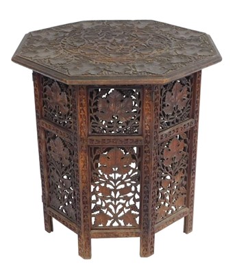 Lot 371 - An Indian hardwood occasional table, the...