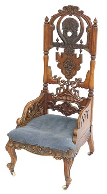 Lot 372 - A 19thC Continental walnut low or nursing...