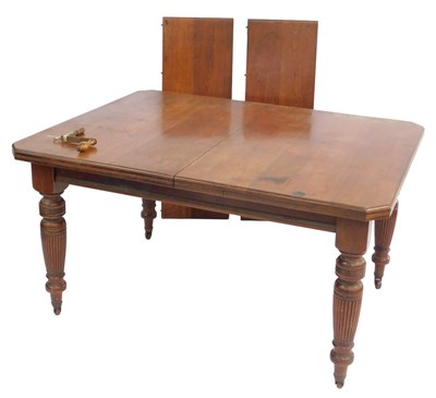 Lot 374 - A late 19thC walnut extending dining...
