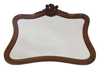Lot 389 - A Continental carved oak cartouche shaped wall...