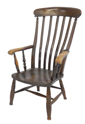 Lot 428 - A 19thC stained elm Grandfather chair, with a...