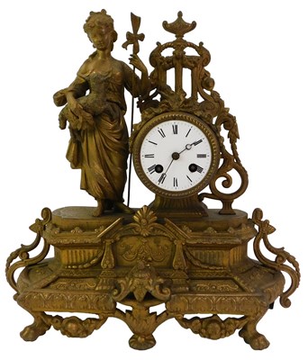 Lot 95 - A late 19thC French gilt metal mantel clock,...