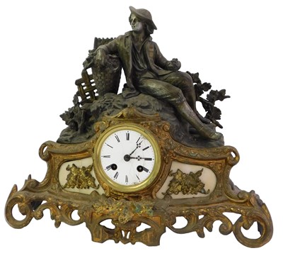 Lot 96 - A late 19thC French gilt metal mantel clock,...