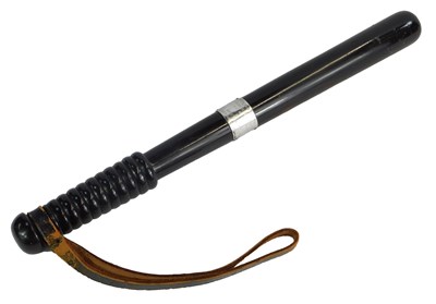 Lot 30 - A mid 20thC ebony police truncheon, bearing...