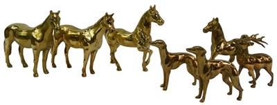 Lot 127 - A group of brass animals, comprising four...