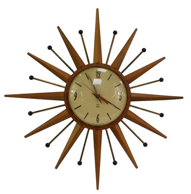 Lot 131 - A Smiths Timecal teak sunburst wall...