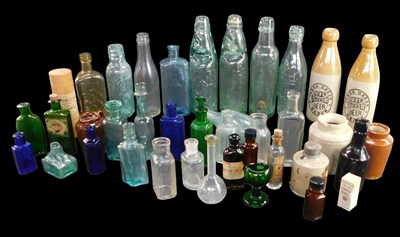 Lot 156 - A quantity of stoneware and glass bottles, to...