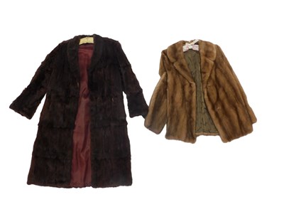 Lot 102 - A full length brown fur coat, and a three...
