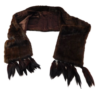 Lot 133 - A brown fur cape, with embroidered initials...