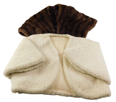 Lot 134 - A sheepskin stole, and a mink light brown stole.