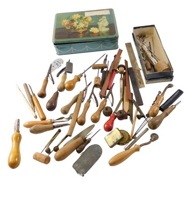 Lot 141 - A collection of sewing equipment, comprising...