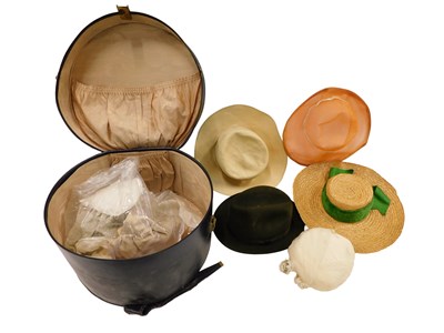 Lot 145 - A hat box and contents of hats, including an...
