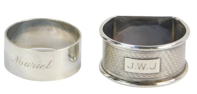 Lot 55 - An Elizabeth II silver napkin ring, of plain...