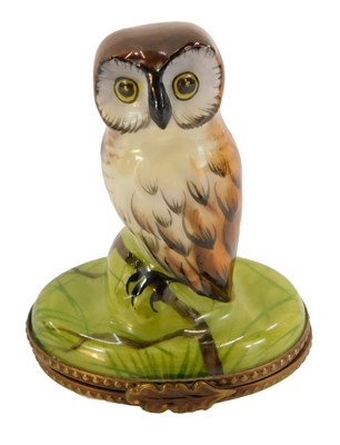 Lot 283 - A Limoges porcelain trinket box, the top...