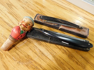 Lot 2028 - Two Straight Razors, and a cork bottle stopper...