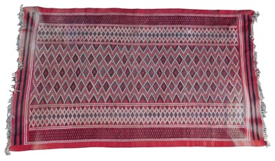 Lot 451 - A Kilim rug, red ground with three rows of...