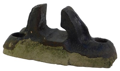 Lot 300 - A cast iron railway chair, indistinctly...