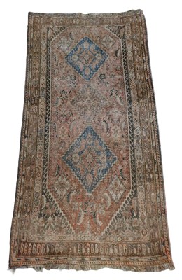 Lot 453 - An Afghan rug, pale red ground, with three...