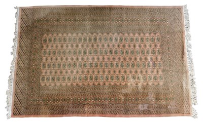 Lot 455 - A Kilim rug, pale red ground, with four rose...
