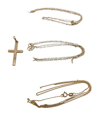 Lot 53 - A 9ct gold crucifix pendant, on fine link...