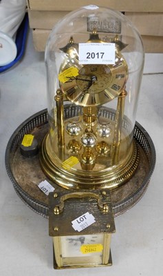 Lot 2017 - A small mantel clock, in the form of a...