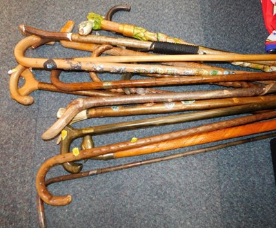 Lot 2062 - Approx ten walking sticks, varying designs....