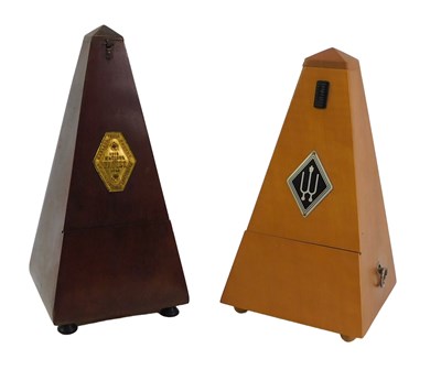 Lot 474 - A Maelzel Paquet mahogany cased metronome, and...