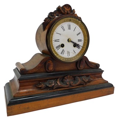 Lot 494 - A Victorian walnut cased mantel clock, the...