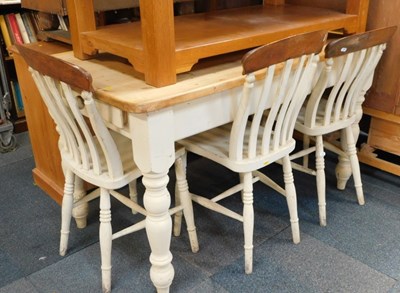 Lot 1001 - A pine kitchen table, the rectangular top with...
