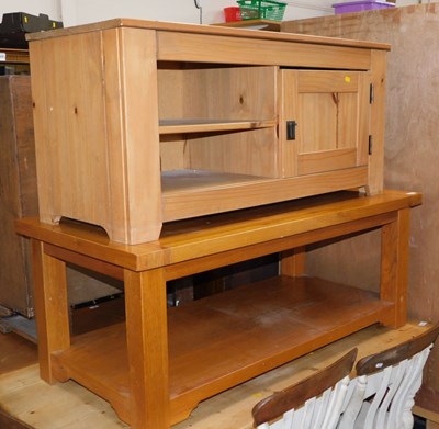 Lot 1002 - A 20thC oak two tier coffee table, 48cm high,...