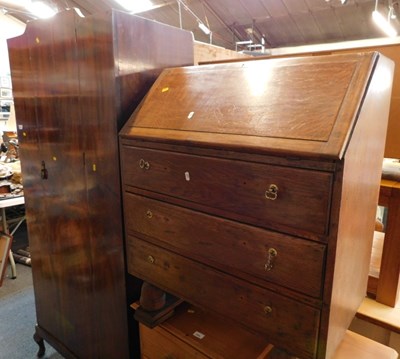Lot 1005 - An early 20thC walnut single wardrobe,...