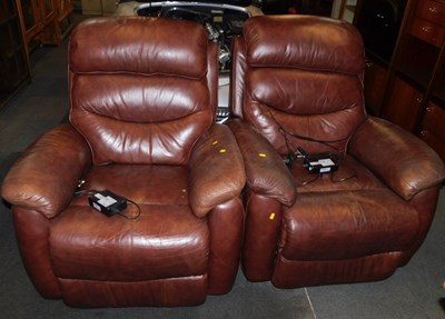 Lot 1013 - Two brown simulated leather upholstered...
