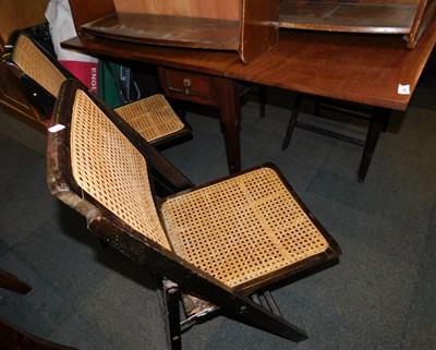 Lot 1036 - A 19thC mahogany drop leaf table, with frieze...