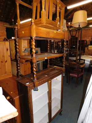 Lot 1055 - An oak two-tier hostess trolley, a nest of two...