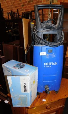 Lot 1059 - A Nilfisk pressure washer, and accessories.