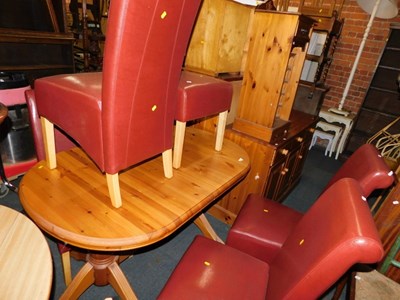 Lot 1061 - A pine extending twin pedestal dining table,...