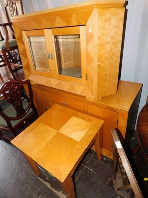 Lot 1074 - A 20thC lightwood sideboard, with three...