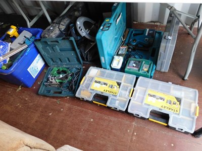 Lot 1090 - A Makita cordless rotary hammer drill,...
