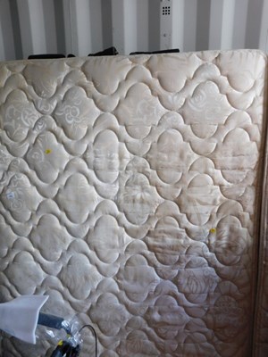 Lot 1099 - A small double bed, with base.