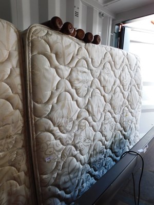 Lot 1100 - A small double bed, with base.