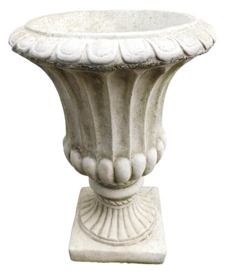 Lot 531 - A composition stone garden planter, of part...
